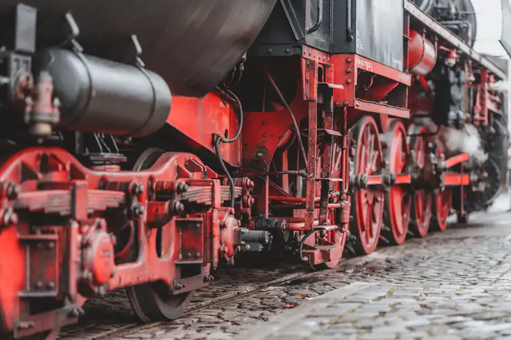 Close-up of a detailed model steam locomotive and trackwork