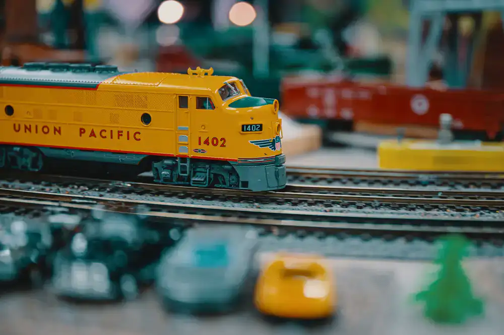 Macro photography of highly detailed miniature locomotives in the hobby shop